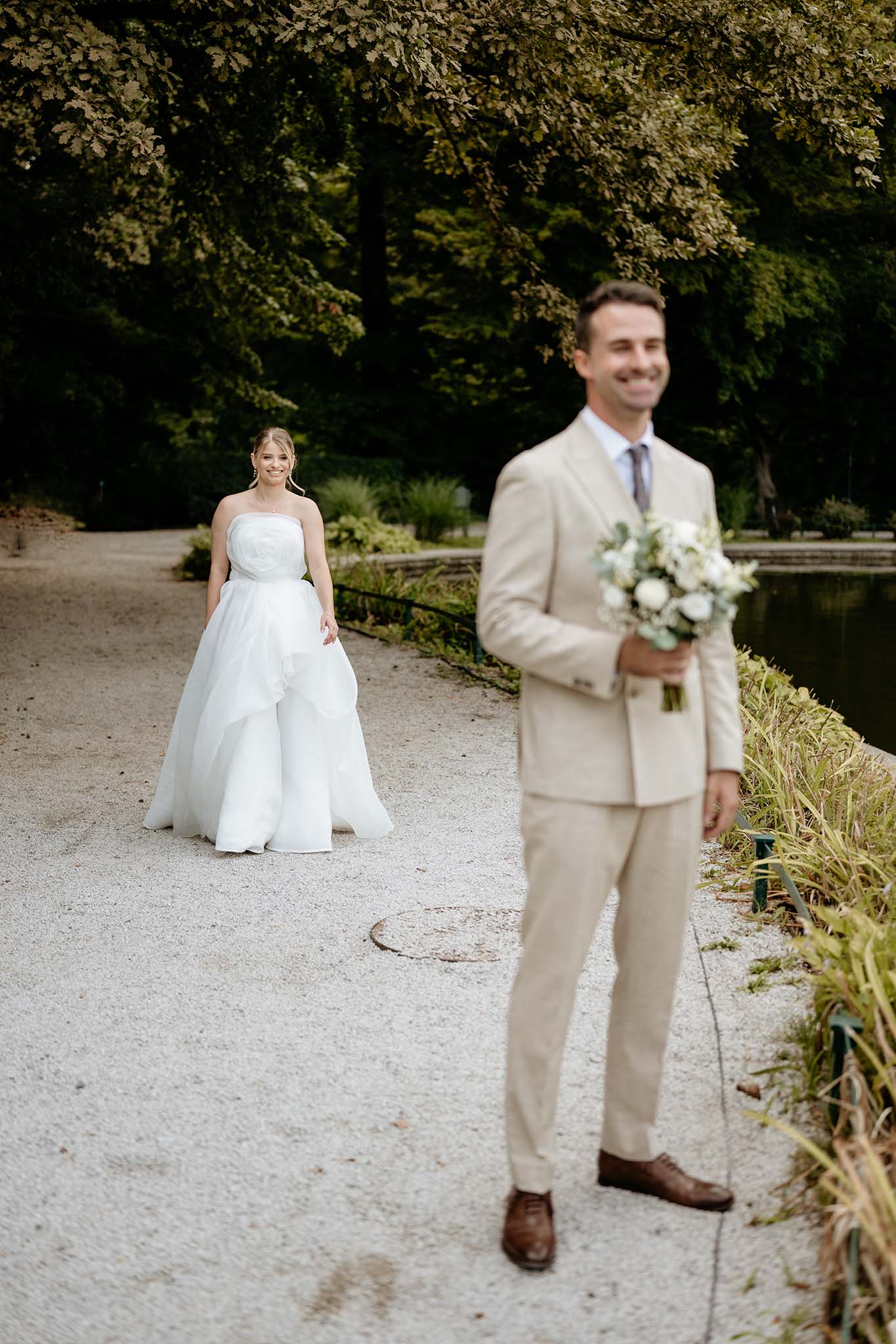 Bride and groom sharing their first look in Maksimir Park in Zagreb.